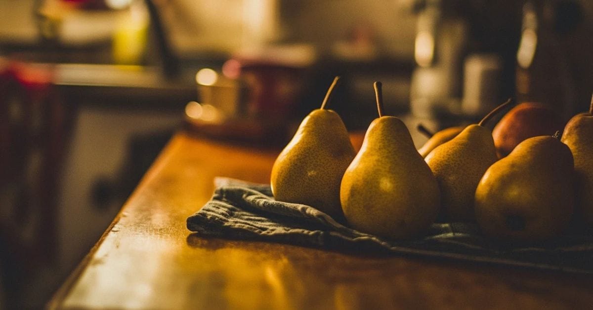 Fresh pears on a wooden table for weight loss benefits